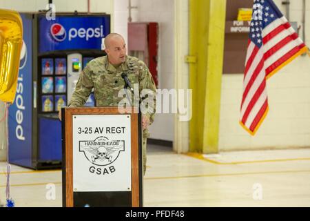 Lieutenant Col. Jacob Miller, 3-25 Aviation Regiment Commander, delivers words of praise to Bravo Company 'Hillclimbers' during a deployment ceremony at Wheeler Army Airfield Jun 5. The 'Hillclimbers' will support Operation Freedom's Sentinel and Operation Resolute Support in the CENTCOM area of responsibility for nine months. Stock Photo