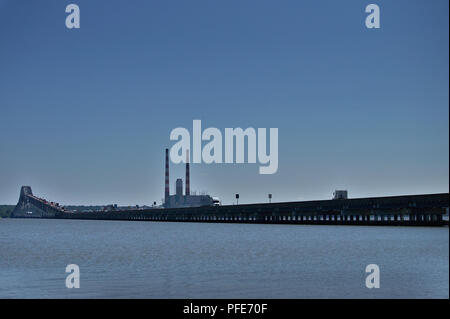 Governor Harry Nice Memorial Bridge over the Potomac River in Maryland with coal power generation plant in background Stock Photo