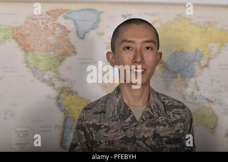 Airman Junjhyun Lee, a 319th Comptroller Squadron debt management apprentice, stands in front of a world map June 11, 2018, on Grand Forks Air Force Base, North Dakota. Lee is originally from Seoul, South Korea, and joined the Air Force for the education and career opportunities. Stock Photo