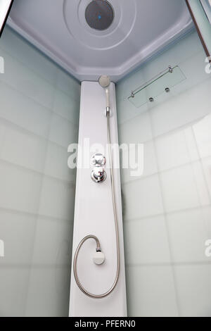 A fragment of modern showers with plumbing Stock Photo