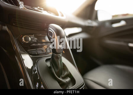 Automatic gear stick of a modern car. Car interior details Stock Photo