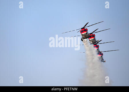 The image of  Dhruv Helicopter seen during one of the aerobatics display at Aero India show in Yelahanka Stock Photo