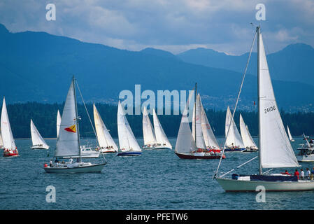Canada, Pacific Northwest, British Columbia, Vancouver, sailboats participating in regatta held on waters of Burrard Inlet. Stock Photo