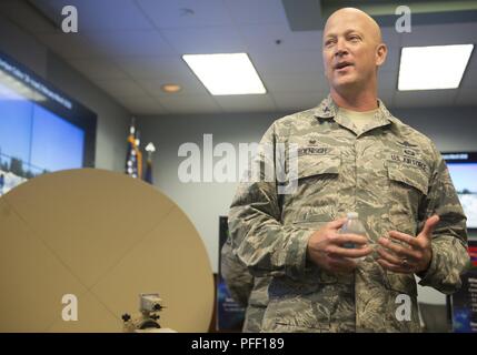 Col. Jeremy Boenisch, 5th Combat Communications Group commander, explains the 5th CCG’s mission for civic leaders during a tour at Joint Base San Antonio-Lackland, Texas, May 31, 2018. The civic leaders visited the base with Gen. Mike Holmes, commander Air Combat Command, to introduce them to 24th Air Force’s cyberspace mission and 25th AF’s intelligence, surveillance and reconnaissance mission. Stock Photo