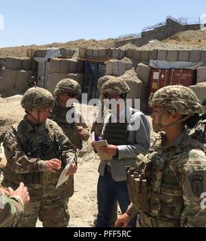 Maj. Gen. Robin L.  Fontes, commander Combined Security Transition Command-Afghanistan, Col. Monte Roné, Deputy Commander for Train Advise Assist Command East, and members of the 201st Military Advising Team tour the 201st Corps Ammunition Supply Point in Afghanistan June11-12, 2018. Stock Photo