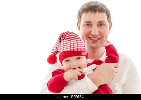 Man holding baby in Christmas costume Stock Photo