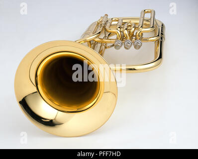 College age woman poses with her baritone euphonium Stock Photo