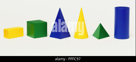 Yellow, blue and green rectangles, squares, cones and triangles. Stock Photo
