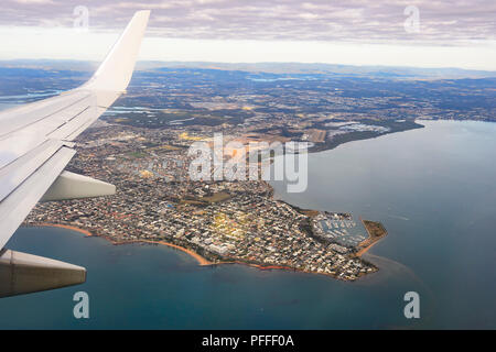 Bird's eye view of Brisbane and the coastline from a jetliner, Queensland, QLD, Australia Stock Photo