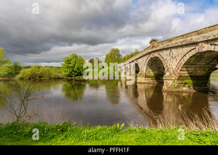 Atcham Old Bridge over the River Severn in Atcham, near Shrewsbury, Shropshire, England, UK Stock Photo