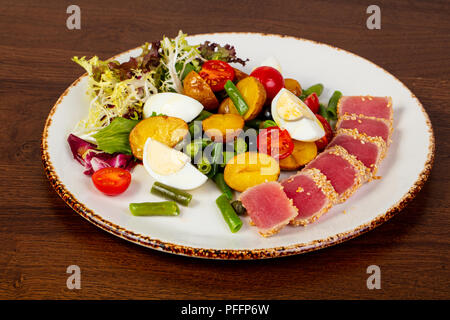 Nicoise salad with roasted tuna Stock Photo