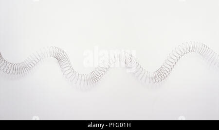 Metal spring, extended Stock Photo - Alamy