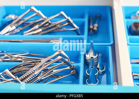 Otorhinolaryngology or ENT surgery instruments in a blue medical box Stock Photo