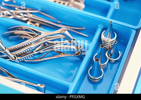 Otorhinolaryngology or ENT surgery instruments in a blue medical box Stock Photo