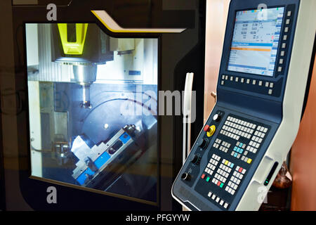 Modern universal CNC milling machine Stock Photo