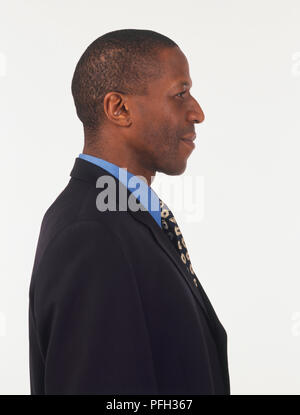 Smiling man in business suit, profile Stock Photo