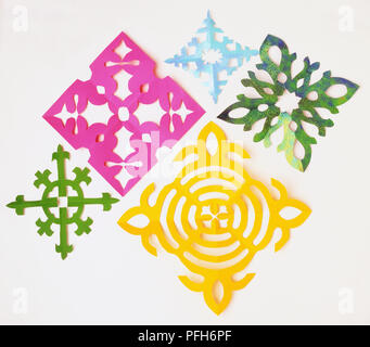 White background with colour snowflakes in Christmas style Stock Photo ...