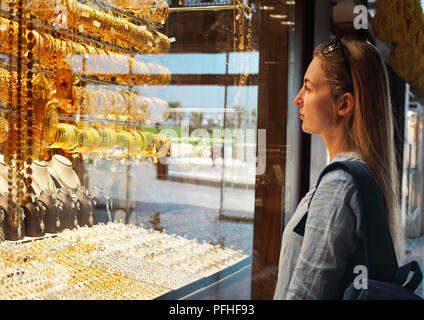 Woman on gold market in Sharjah City, United Arab Emirates Stock Photo