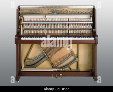 Upright piano, opened, front view Stock Photo
