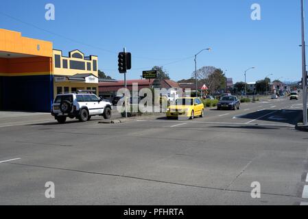 Moving vehicles at traffic intersection in Australian town of Kempsey in New South Wales on 13 August 2018. Stock Photo