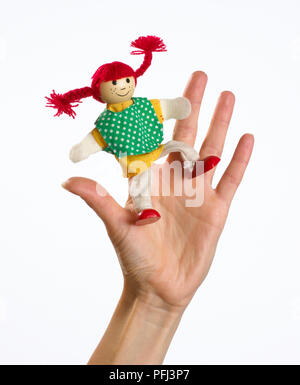 Woman's hand with finger puppet on index finger, close-up Stock Photo