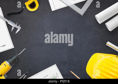 Construction industry concept. Projects and tools on work desk with free space for text. Hero header image concept. Flat lay, Top view. Stock Photo