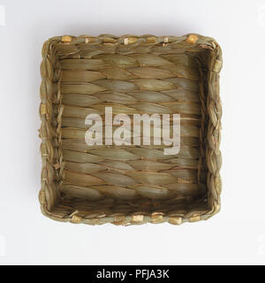A square shaped woven basket, view from above Stock Photo