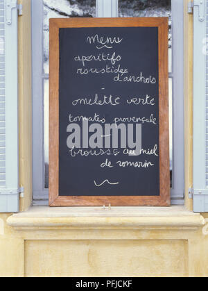 France, Provence, menu written in chalk on blackboard Stock Photo