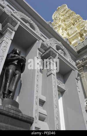 Great Britain, England, London, Manor Park, Sri Murugan Temple, ornate facade with bronze statue, low angle view Stock Photo