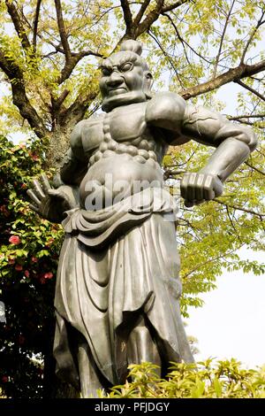 Japan, Tokyo, Bunkyo, Gokoku-ji Temple, statue in the temple's grounds Stock Photo