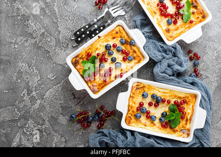 Cheesecake with fresh berries. Cheesecake with blueberry and red currant Stock Photo