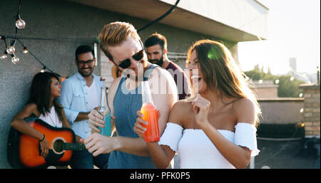 Happy friends laughing and smiling outdoors Stock Photo