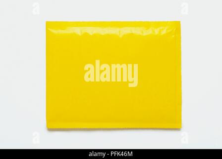 Yellow padded envelope Stock Photo