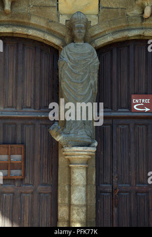 Doorway and sculpture on Cathedrale Saint Pol d'Aurelien in Place Alexis Gourvennec, St Pol de Leon, Finisterre, Brittany, France Stock Photo