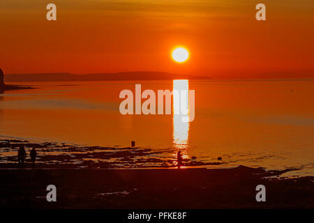 Streak of sunlight going across the sea Stock Photo