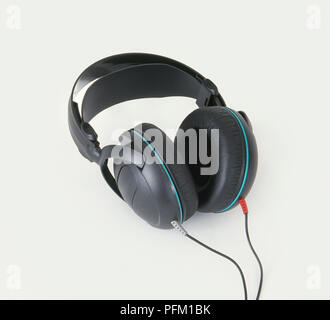 Close-up of black headphones on black background Stock Photo - Alamy