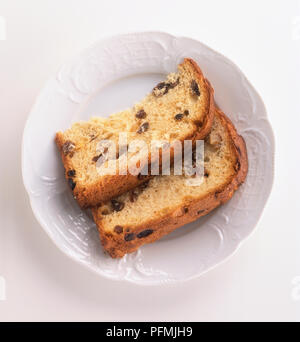 Two slices of Panettone cake on a plate, view from above Stock Photo