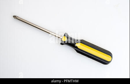 Black and yellow handled philips screwdriver Stock Photo