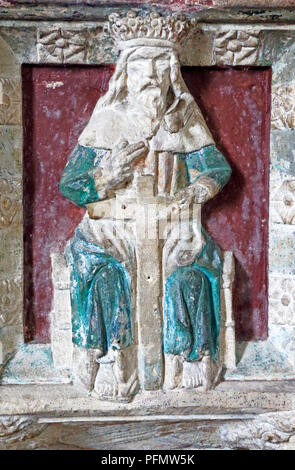 A detail panel from the 15th century font in the parish church of St Edmund at Acle, Norfolk, England, United Kingdom, Europe. Stock Photo