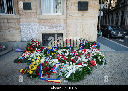 BRATISLAVA, SLOVAKIA - AUGUST 21, 2018: Wreaths by the memorial tablet on the main building of the Comenius University (UK) 50 years after Soviet invasion into Czechoslovakia in Bratislava, Slovakia Credit: Lubos Paukeje/Alamy Live News Stock Photo