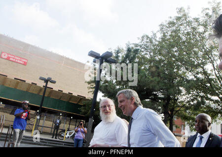 Brooklyn, New York, USA. 21st Aug, 2018. New York City Mayor Bill De Blasio along with NYC Commissioner of Transportation Polly Trottenberg, New York City Council Members Antonio Reynoso, Stephen Levin and Ydanis Rodriguez attends press conference and delivers remarks on the L train shutdown mitigation plan on August 21, 2018 in the Bushwick section of Brooklyn, New York. Credit: Mpi43/Media Punch/Alamy Live News Stock Photo