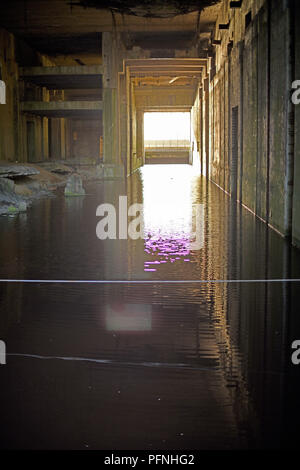 View of the diving pool in the submarine bunker Valentin, in which the finished submarines could have been tested up to Sehrohrtiefe before they run from pile to the Weser, added on 11.08.2018. The submarine bunker Valentin in Bremen-Farge was built on a surface of more than 3.5 hectares in the years 1943 to 1945 by forced laborers, making it the largest freestanding bunker in Germany. In this important armament project of the German Navy naval submarines of type XXI were to be manufactured in section construction. After the World War, the Federal Navy used parts of the site as a material stor Stock Photo