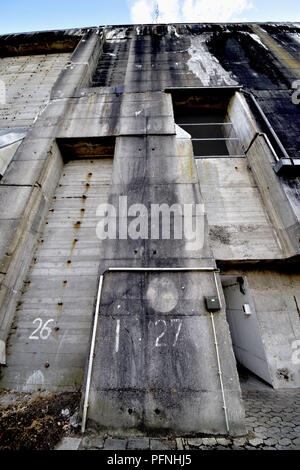 Solid exterior walls of the submarine bunker Valentin, taken on 11.08.2018. The submarine bunker Valentin in Bremen-Farge was built on a surface of more than 3.5 hectares in the years 1943 to 1945 by forced laborers, making it the largest freestanding bunker in Germany. In this important armament project of the German Navy naval submarines of type XXI were to be manufactured in section construction. After the World War, the Federal Navy used parts of the site until 2010 as a material store. In the years 2011 to 2015, a visitor center with the memorial site Denkort Bunker Valentin was created,  Stock Photo