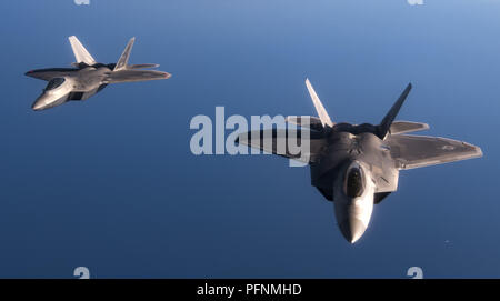 August 21, 2018 - Spangdahlem Air Base, Rheinland-Pfalz, Germany - U.S. Air Force F-22 Raptors from the 95th Fighter Squadron, 325th Fighter Wing, Tyndall Air Force Base, Fla., fly in formation after an air refueling over the Mediterranean Sea. After refueling, the F-22s trained with Spanish aircraft and landed at Los Llanos Air Base in Albacete, Spain where a pilot briefed the Raptor's capabilities to military and civilian personnel from NATO allied nations. Credit: U.S. Department Of Defense/Russian Look/ZUMA Wire/Alamy Live News Stock Photo