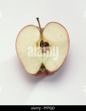 Malus domestica, Apple, apple half showing core and seeds. Stock Photo