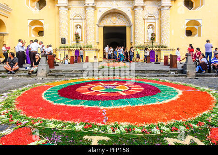 Antigua, Guatemala -  March 15, 2015: Lent procession carpet outside church in UNESCO World Heritage Site with famous Holy Week celebrations. Stock Photo