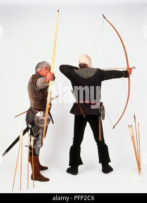 Two men dressed in medieval costumes in the park Stock Photo - Alamy