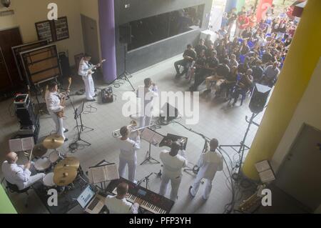 KOTA KINABALU, MALAYSIA (May 23, 2018) Members of the U.S. 7th Fleet Band perform at Universiti Malaysia Sabah in Kota Kinabalu, Malaysia. The band is supporting a U.S. 7th Fleet theater security cooperation mission and will be traveling to several Indo-Pacific countries in the coming weeks. Stock Photo