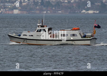 Grey Swan, believed to be a Ministry of Defence launch based at Faslane, passing Greenock during Exercise Joint Warrior 18-1. Stock Photo