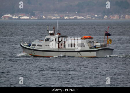 Grey Swan, believed to be a Ministry of Defence launch based at Faslane, passing Greenock during Exercise Joint Warrior 18-1. Stock Photo